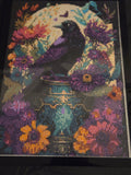 Dark raven surrounded by purple and golden flowers and butterflies beneath a bright moon