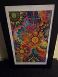 Colorful abstract floral diamond painting with a white mat and black frame