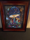 Colorful mushrooms and butterflies diamond painting displayed in a brown frame